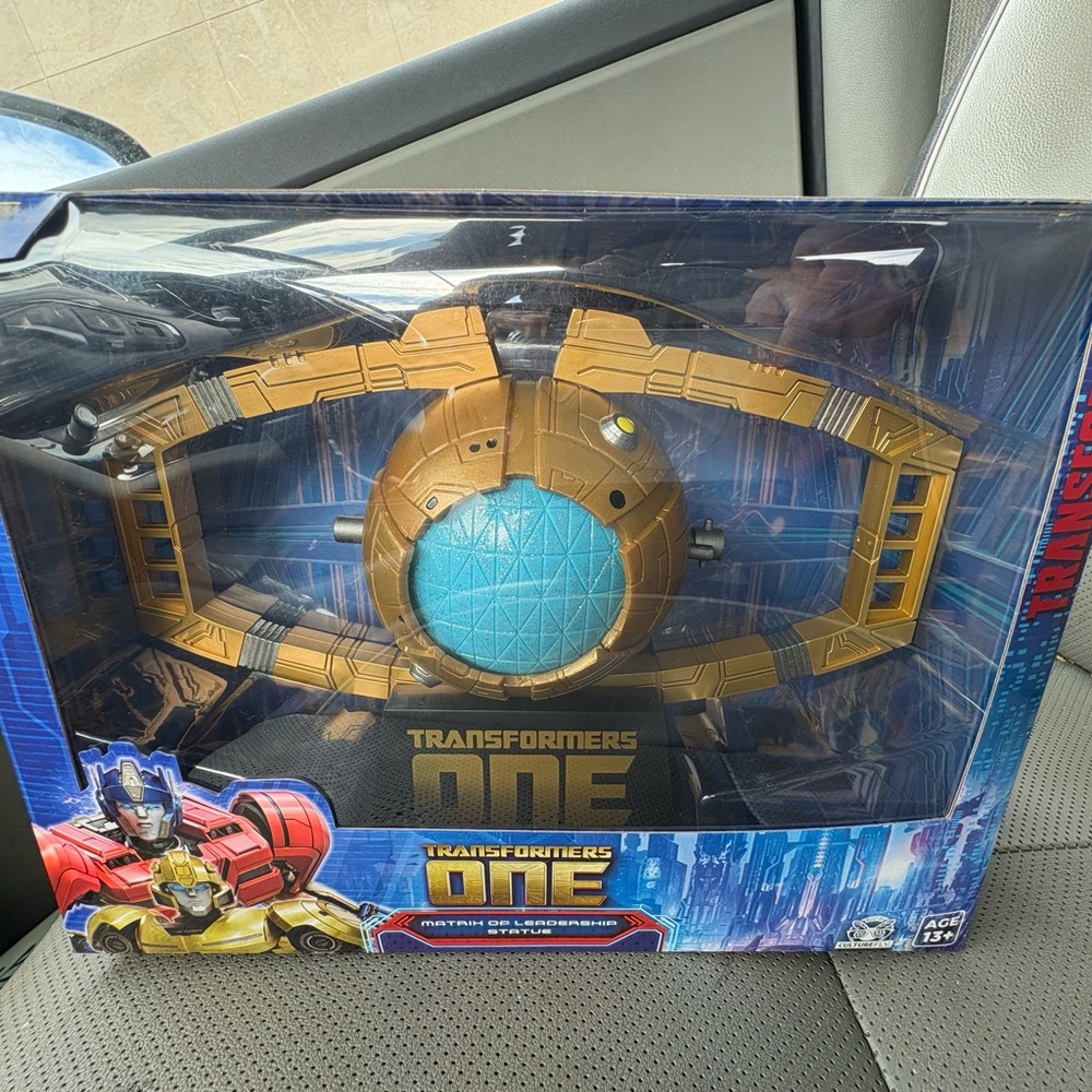 One Gold and Blue Action Figure